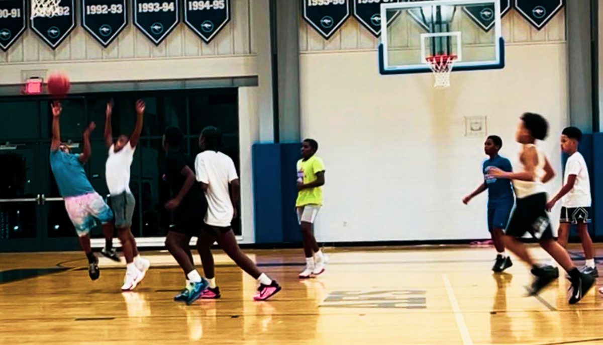Middle school basketball practice in the Berman Gym gets competitive