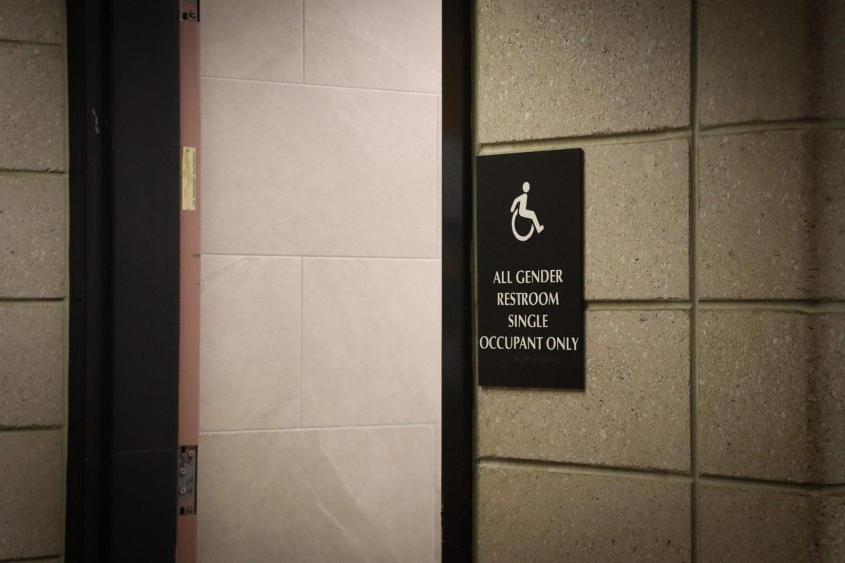 "During the last week of October, a sign that read “Adults Only” appeared on one of the doors of the gender-neutral bathroom."