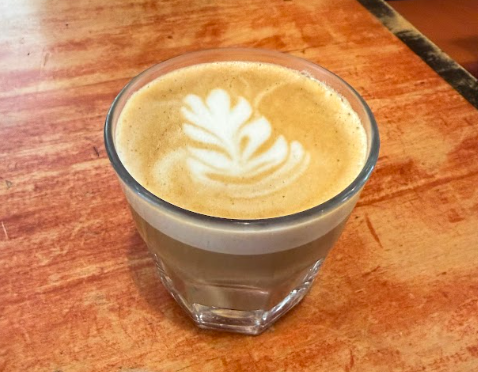 Photograph of a latte, a popular caffeinated drink.