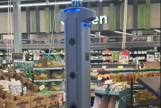 A close up photo of the robot "Marty" scanning through a produce aisle